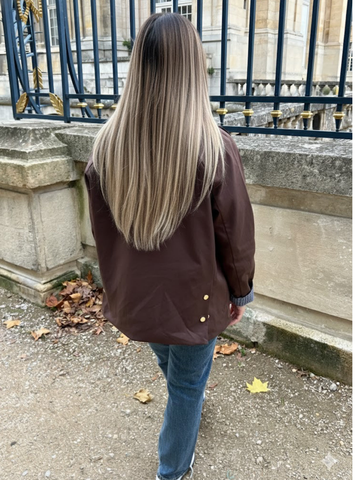 Veste parka cirée marron avec détails velours et manches à carreaux